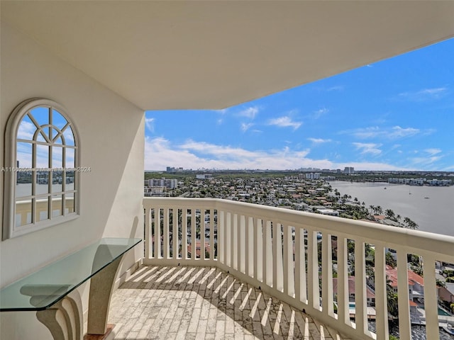 balcony featuring a water view