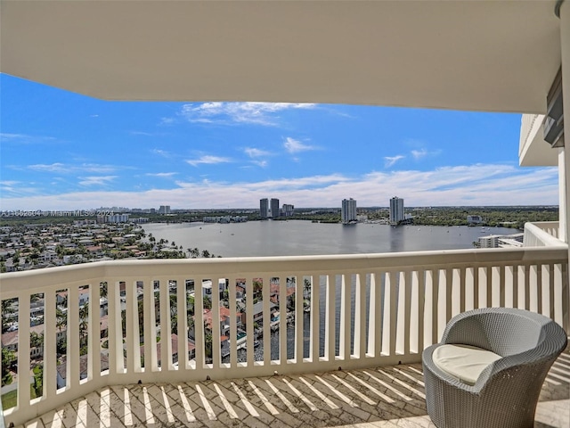 balcony featuring a water view