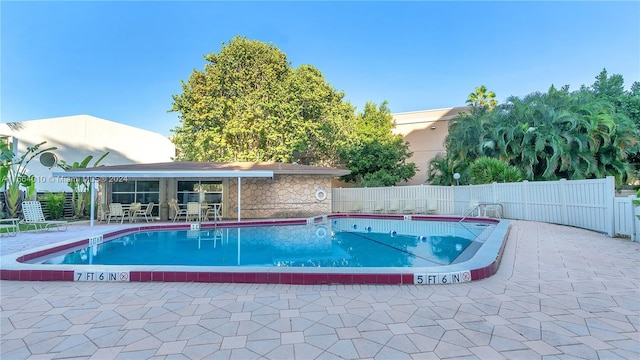 view of pool with a patio