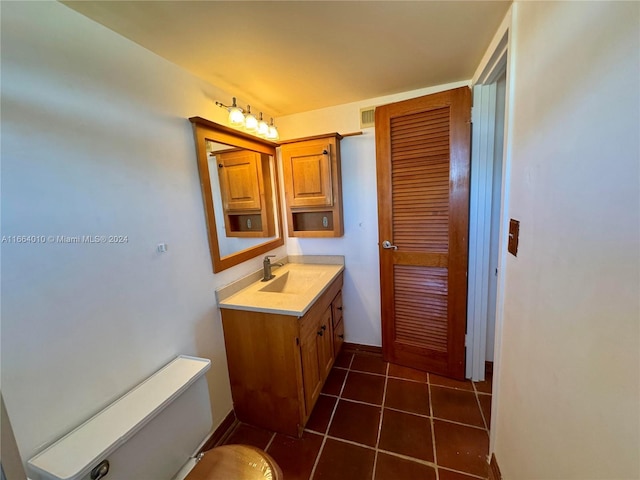 bathroom featuring tile patterned floors and vanity