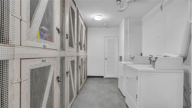 washroom featuring washer and dryer