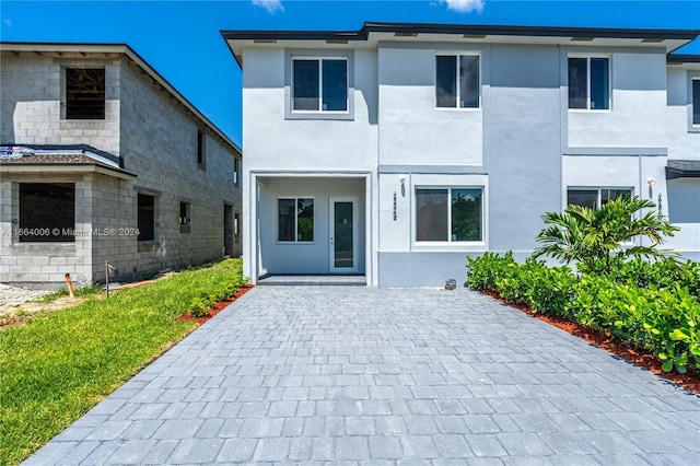 22425 SW 125th Ave Unit 22425, Miami, FL 33170 - contemporary house with stucco siding and decorative driveway