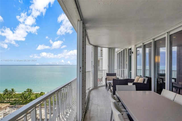 balcony featuring a water view