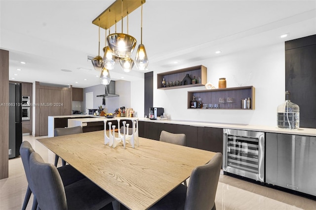 dining area featuring beverage cooler and bar