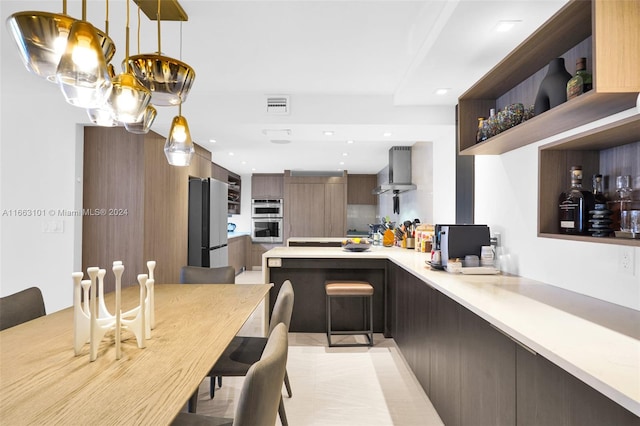 dining space featuring bar area