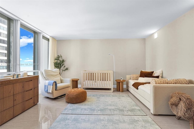 carpeted bedroom with a wall of windows