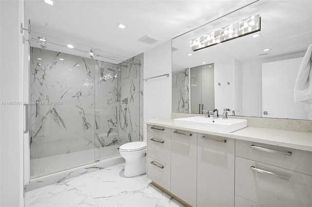 bathroom featuring walk in shower, vanity, and toilet