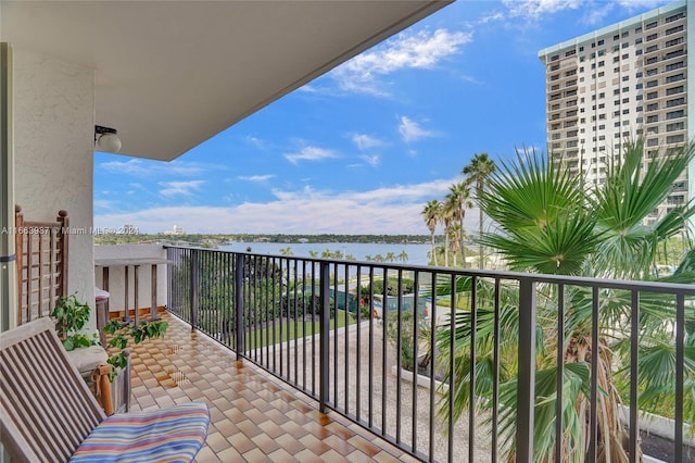 balcony featuring a water view