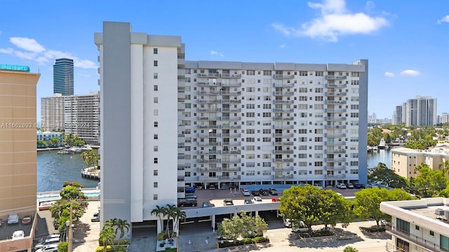 137 Golden Isles Dr Unit 1510, Hallandale Beach, FL 33009 - view of building exterior featuring a water view
