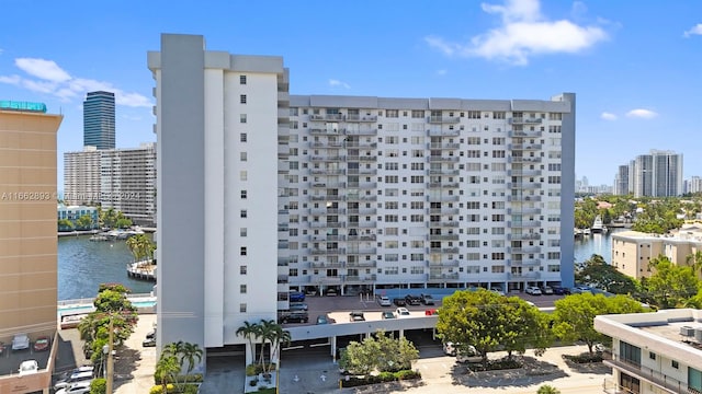 view of building exterior featuring a water view