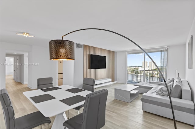 dining space featuring light hardwood / wood-style flooring