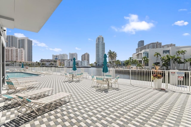 view of patio with a community pool