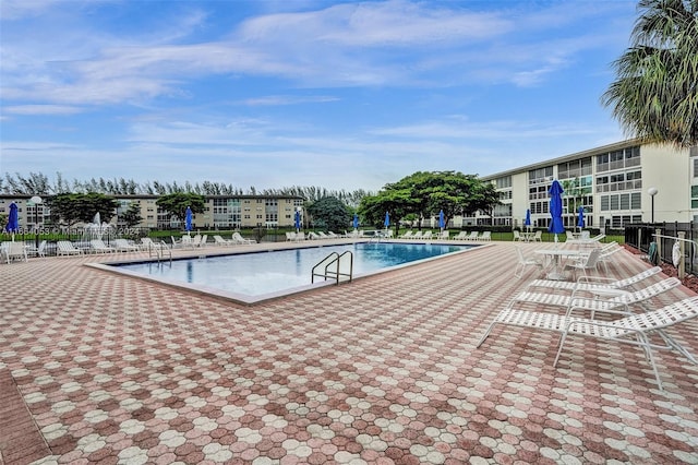 view of swimming pool featuring a patio