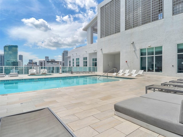 view of pool with a patio