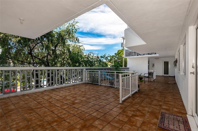 view of patio / terrace with a balcony