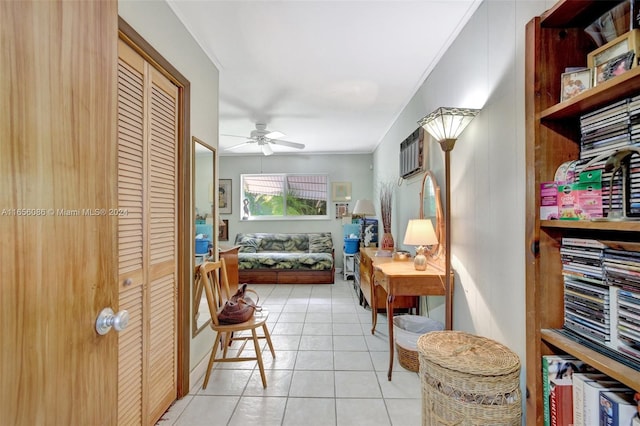 interior space with crown molding and light tile patterned floors