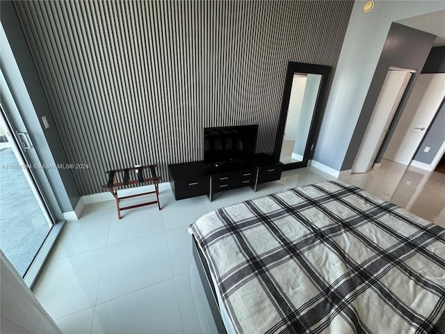 bedroom with tile patterned floors