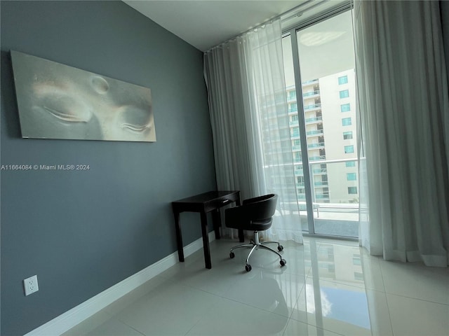 office space with tile patterned floors