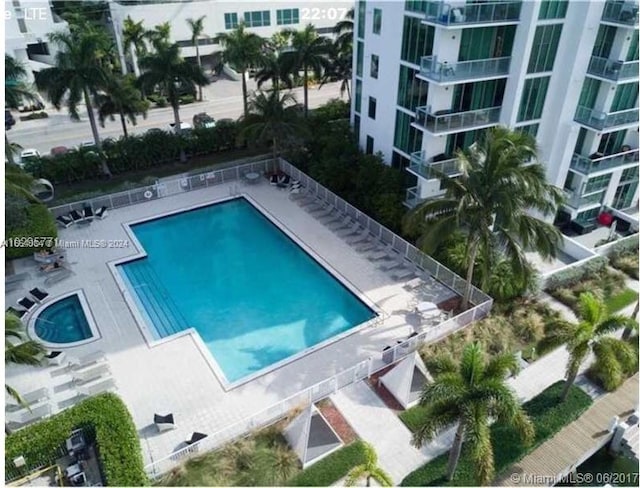 view of swimming pool with a patio area