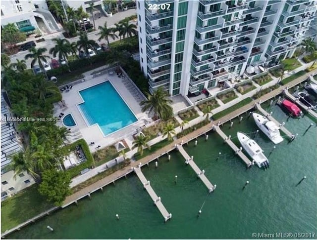 birds eye view of property featuring a water view