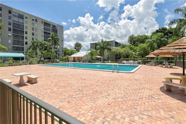 view of pool featuring a patio area