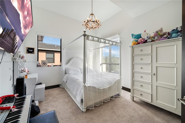 bedroom with light carpet and a chandelier