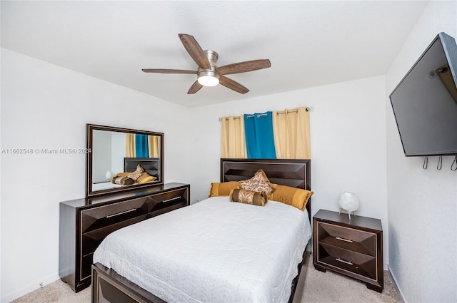 bedroom featuring ceiling fan and light colored carpet