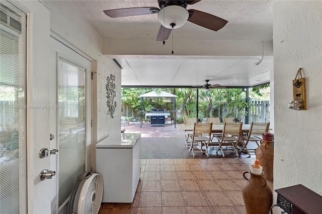 view of patio with a gazebo and a grill