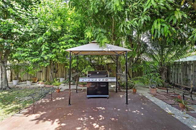 view of patio featuring a gazebo and area for grilling