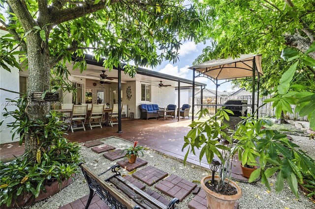 view of patio / terrace featuring ceiling fan and an outdoor hangout area