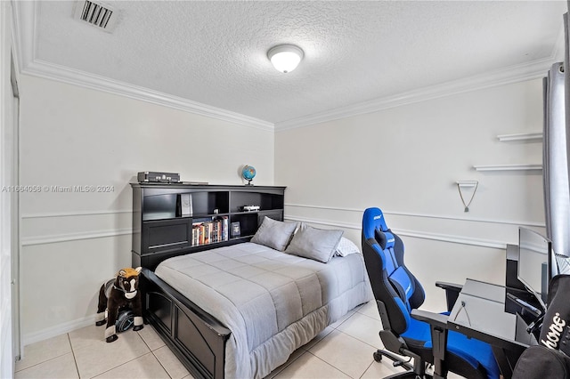 bedroom with light tile patterned floors, a textured ceiling, and crown molding