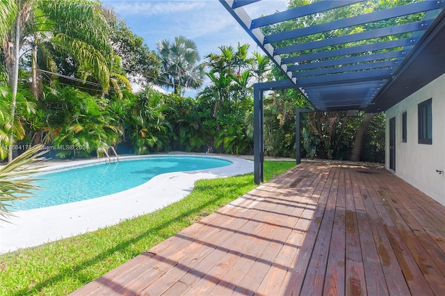 view of pool with a pergola and a deck