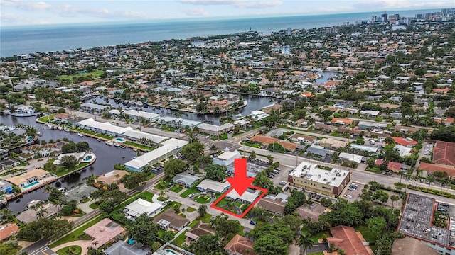 drone / aerial view featuring a water view