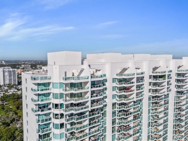 view of building exterior featuring a city view