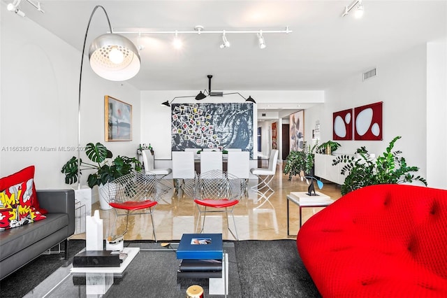 living room featuring visible vents