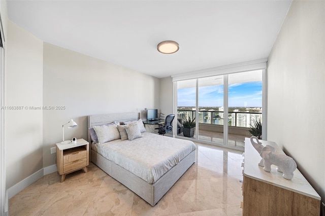 bedroom with access to exterior, baseboards, floor to ceiling windows, and marble finish floor