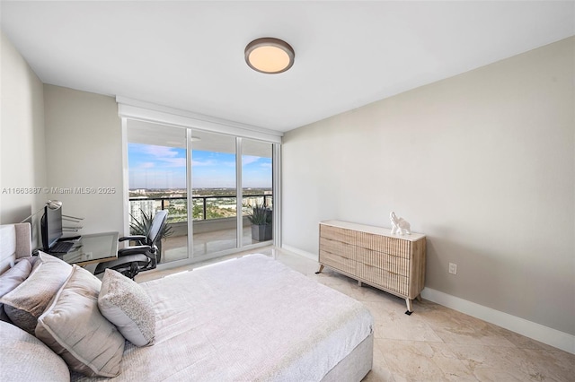 3201 NE 183rd St Unit Gs3107, Aventura, FL 33160 - bedroom featuring access to outside, floor to ceiling windows, and baseboards