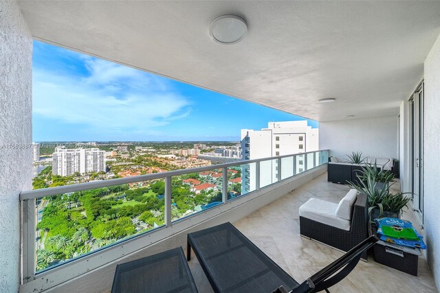 balcony featuring a view of city