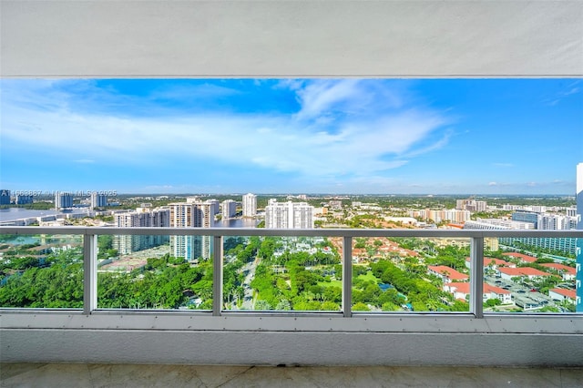 balcony featuring a view of city