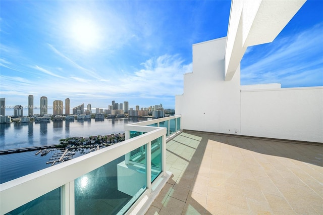 balcony with a city view and a water view