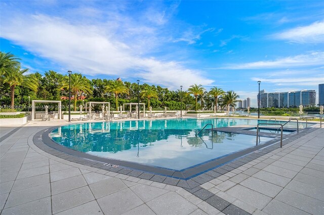 pool with a patio area