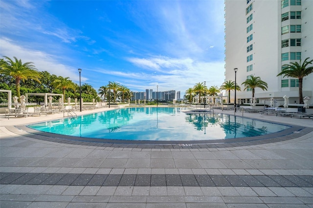 pool with a patio area