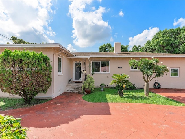 view of front of home featuring a patio area