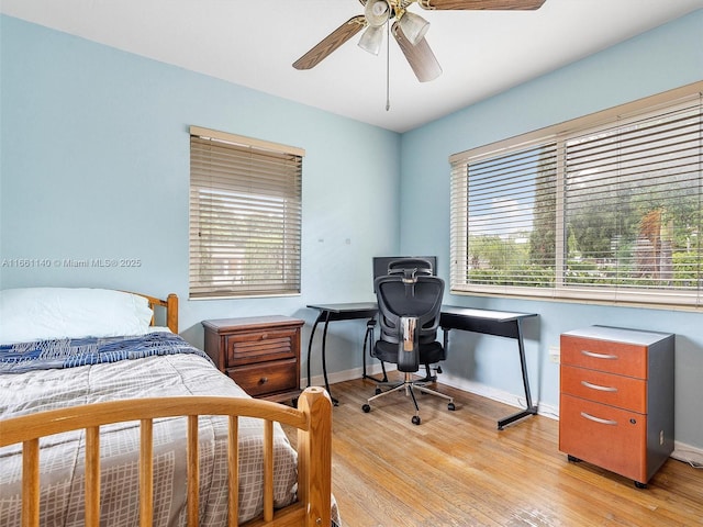 bedroom featuring ceiling fan and light wood-type flooring