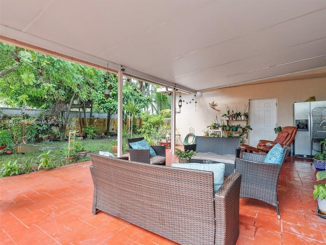 2380 SW 7th St, Miami, FL 33135 - fenced backyard with a patio area and an outdoor living space