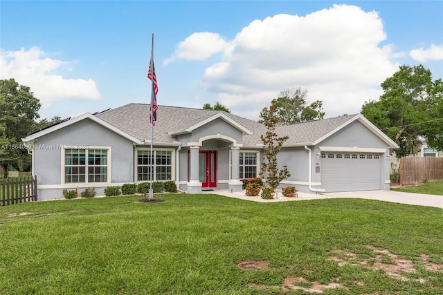 single story home with a garage and a front yard