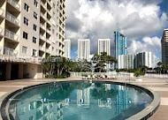 view of pool with a city view