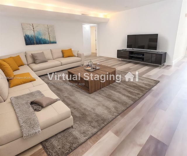 living room with wood-type flooring