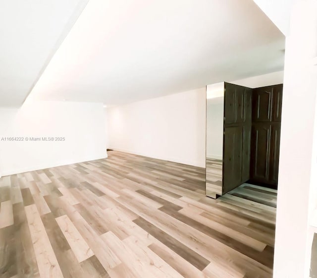 bonus room featuring light hardwood / wood-style flooring