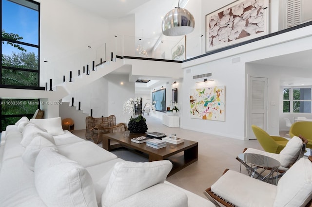325 Campana Ave, Coral Gables, FL 33156 - living area with a towering ceiling and stairs